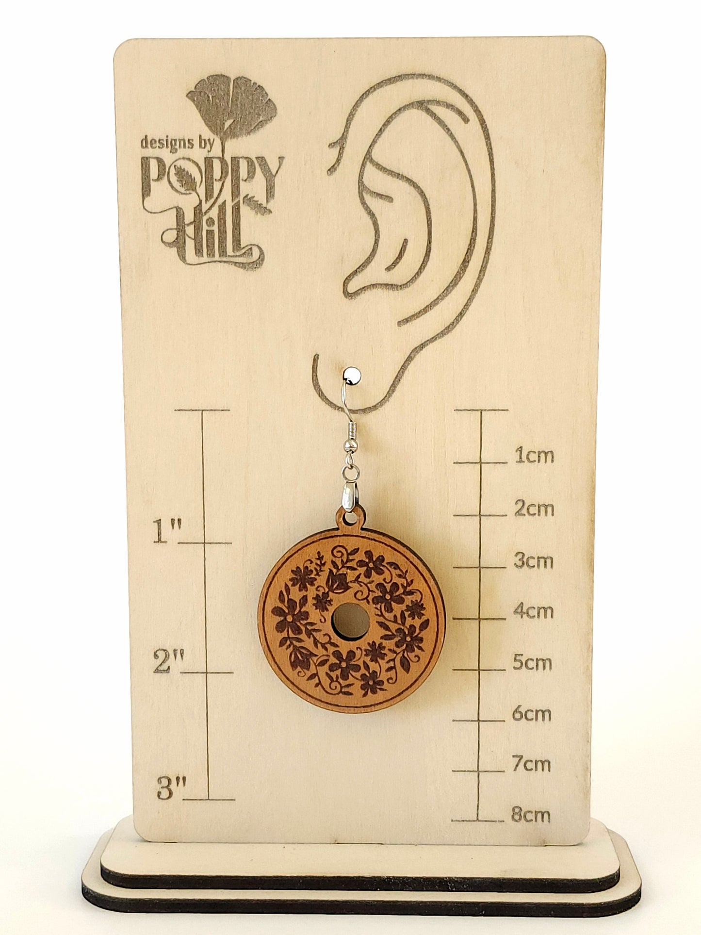 Circular Earrings with a Floral Wreath Design