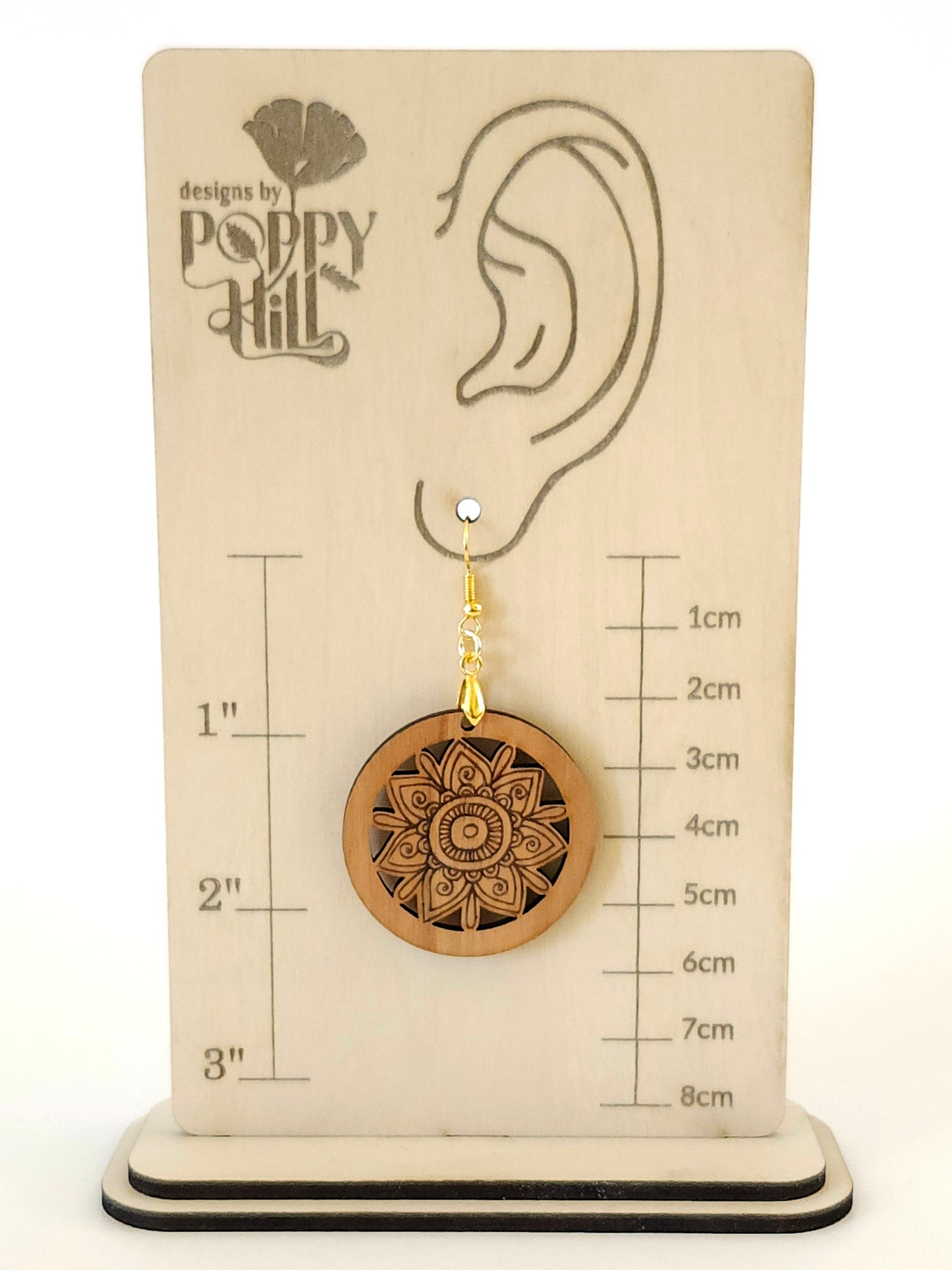 Circular Earrings with a Tribal Design